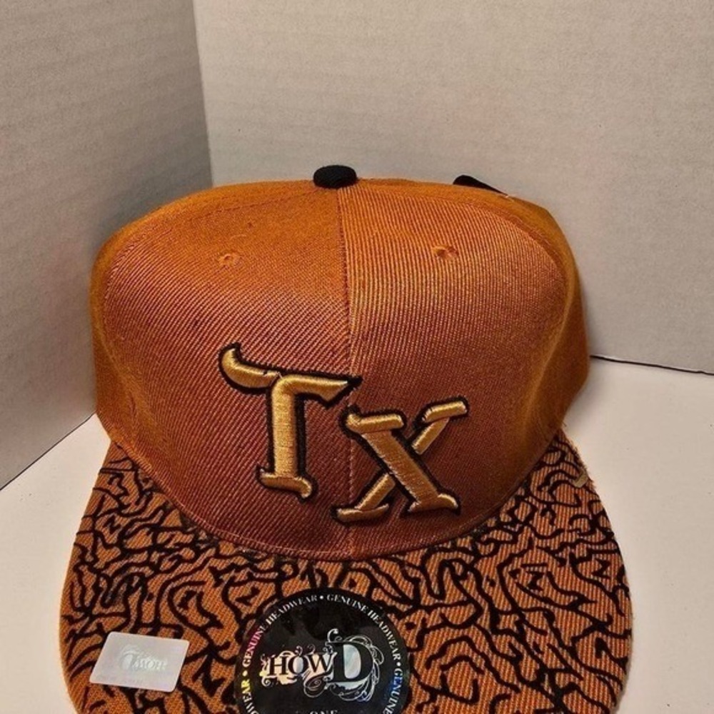 0053NWT HowD TX ball cap‎ black orange Texas squiggly adjustable. OS